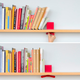 Illustration for article titled Clamp Shelf Tightens So Your Books Never Fall Again